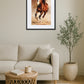 tableau cheval au galop accroché au mur au-dessus d’un canapé avec plante