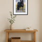 tableau cheval frison accroché au mur au-dessus d’un meuble en bois