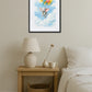 Tableau éléphant volant avec des ballons accroché au mur dans une chambre