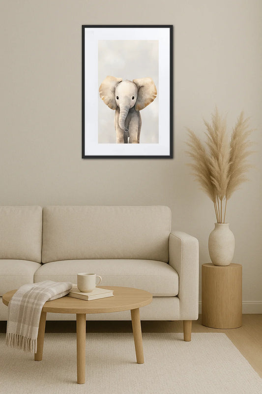 Tableau éléphant au mur dans une chambre bébé avec canapé et décoration