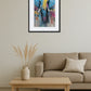 Tableau éléphant pop art street art variation accroché au-dessus d’un canapé beige avec table basse en bois et vase avec herbes séchées