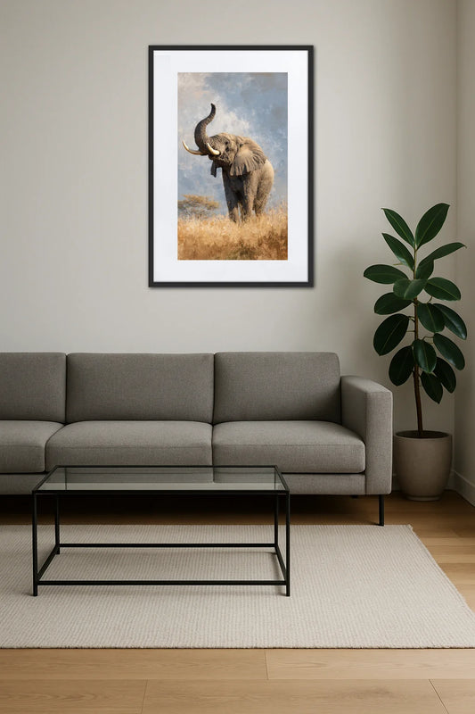 Tableau éléphant trompe en l’air accroché au mur au-dessus d’un canapé dans un salon