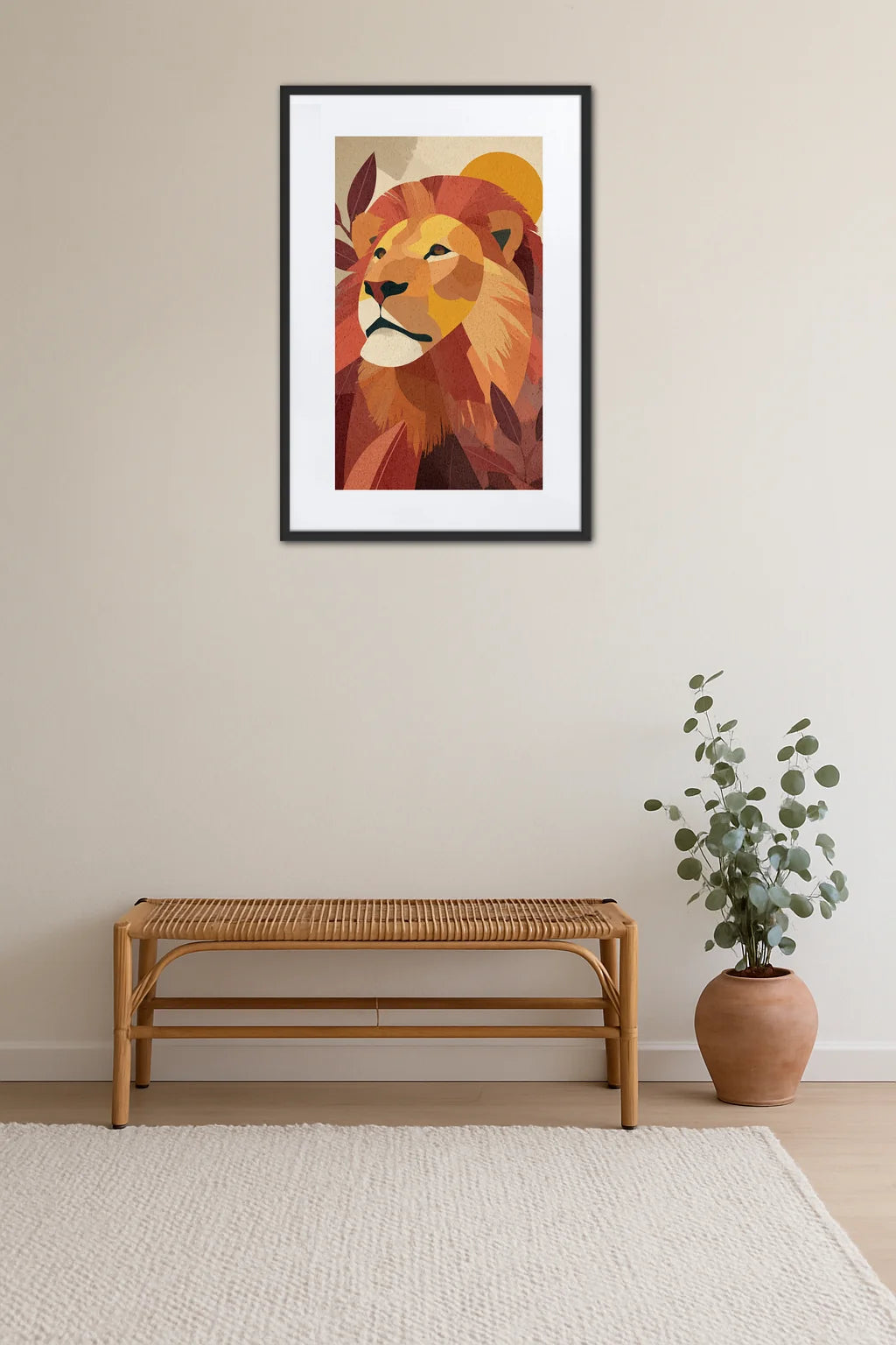 Tableau lion abstrait en aplat de couleur au-dessus d’un banc en rotin avec plante en pot terre cuite