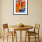 tableau rouge avec chevaux accroché au mur au-dessus d’une table à manger