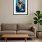 tableau singe pop art avec appareil photo au dessus d’un canapé avec plante
